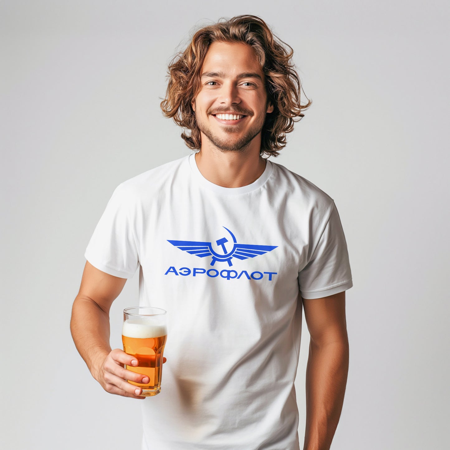 Young handsome smiley model man wearing vintage Aeroflot Soviet airlines white unisex T-shirt. www.artsoviet.com