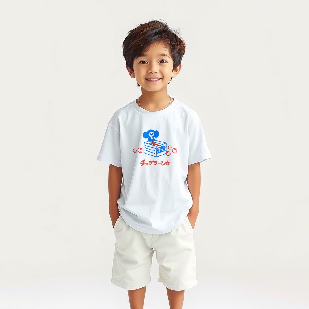 Cute japanese boy wearing youth white Cheburashka T-shirt with cartoon print of Cheburashka on box of oranges with Japanese チェブラーシカ logo.