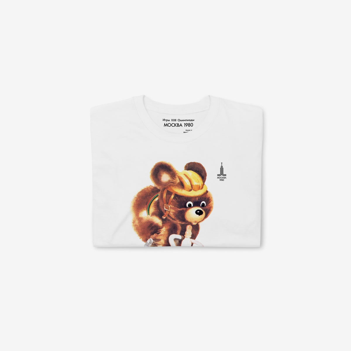 Original Soviet Moscow 1980 bear mascot Misha Cycling white unisex T-Shirt. Folded