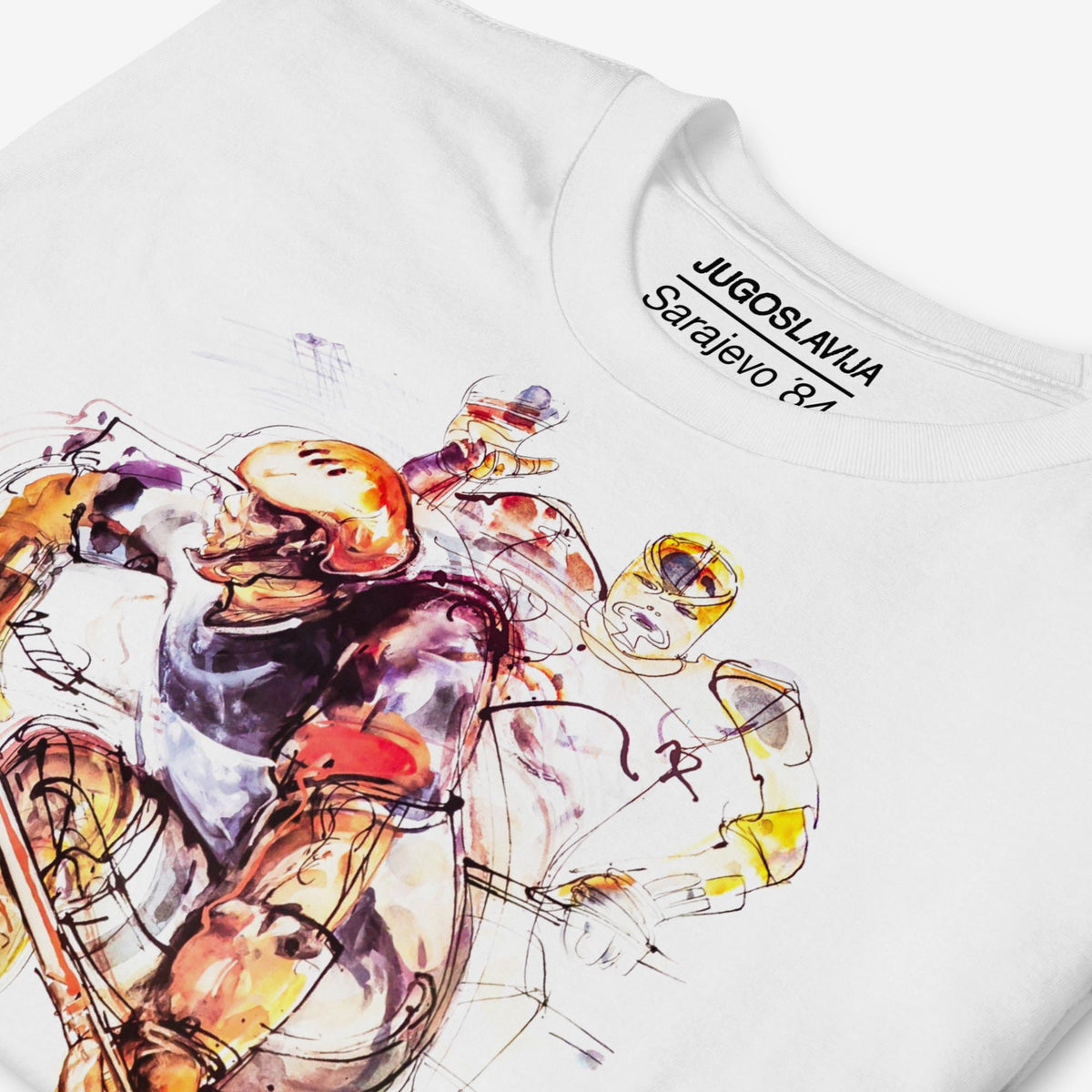 White unisex T-shirt featuring large artwork of Sarajevo 1984 Yugoslavian Winter Olympics Hockey artwork by Ismar Mujezinovic. Closeup