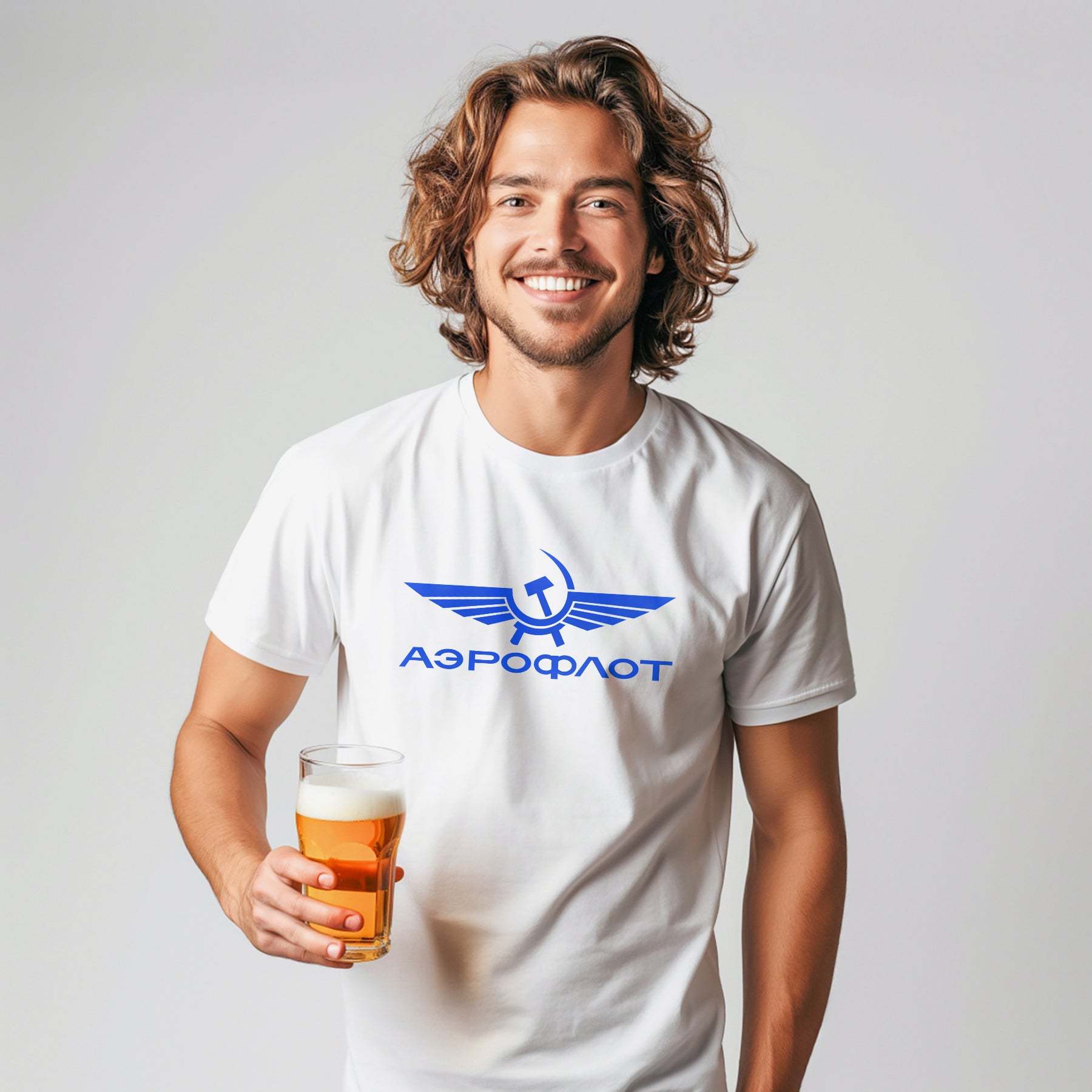 Young handsome smiley model man wearing vintage Aeroflot Soviet airlines white unisex T-shirt. www.artsoviet.com