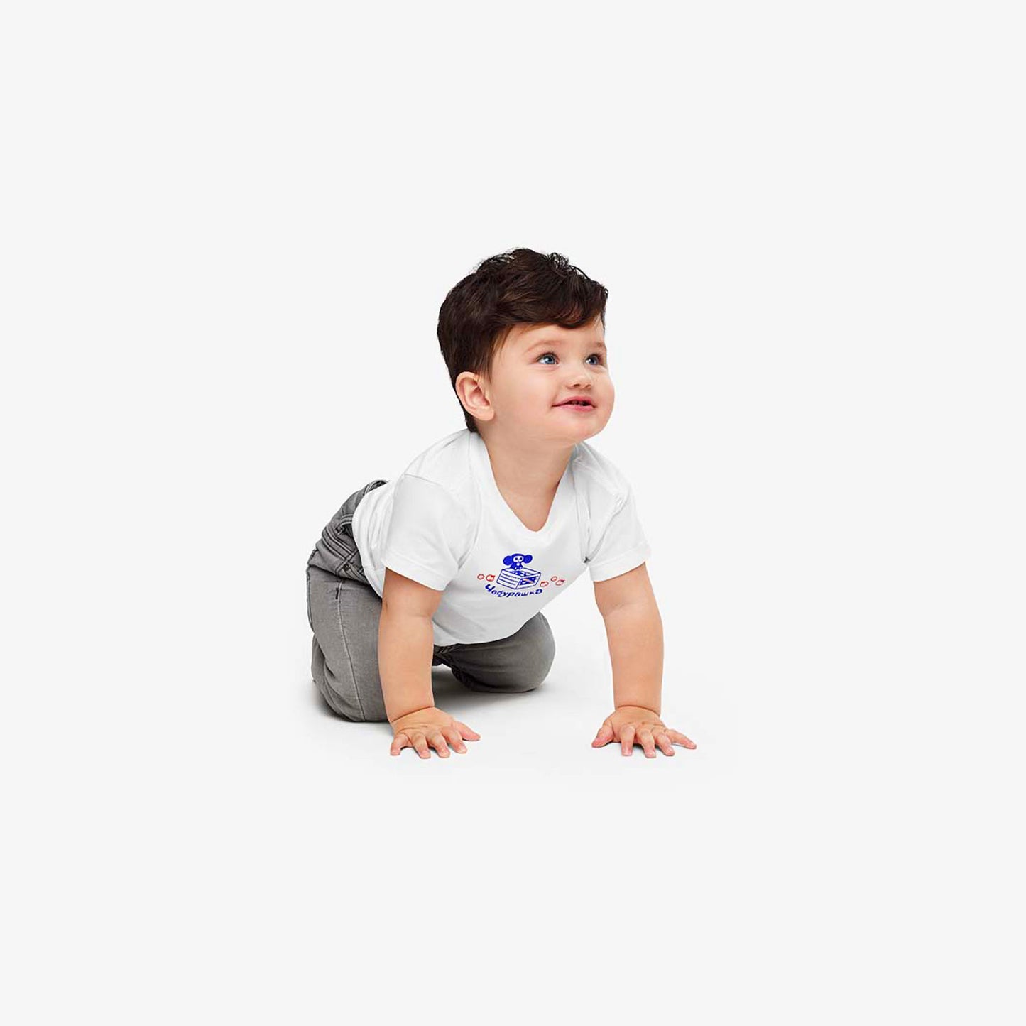 Baby boy wearing white unisex baby T-shirt with Cheburashka on a box of with oranges. Beloved Soviet cartoon character. www.artsoviet.com