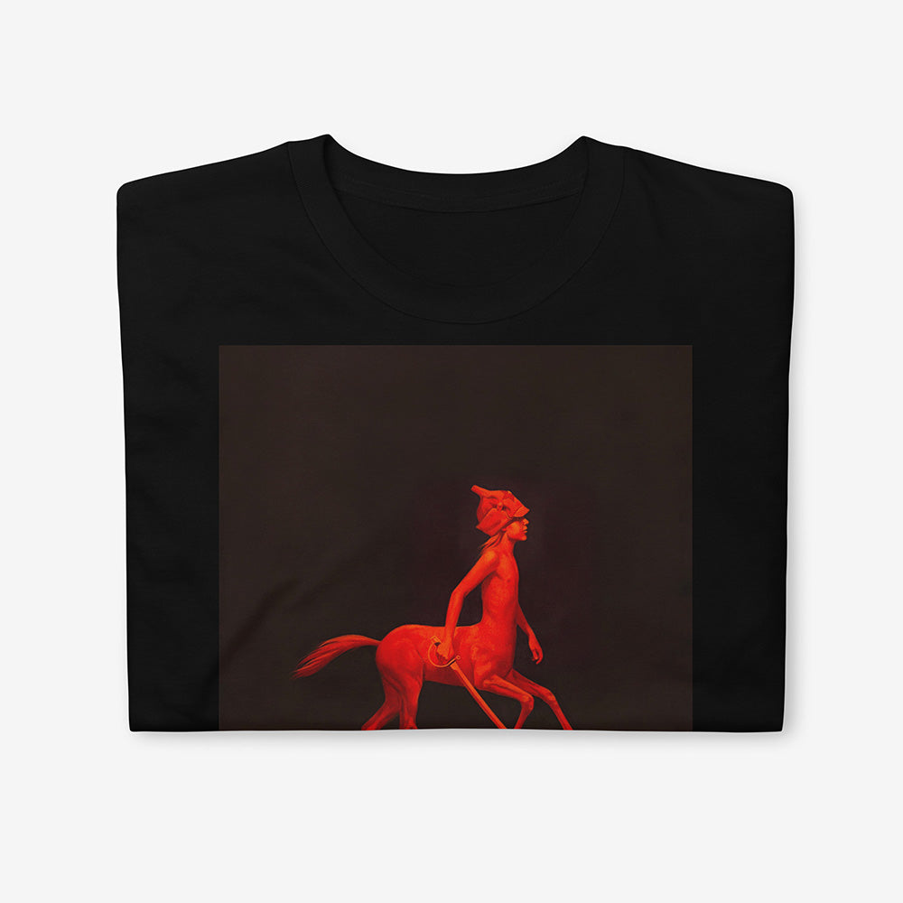 Unisex T-shirt featuring red-painted centaur boy with budenovka and sword on minimalist black background, surreal Soviet-style art