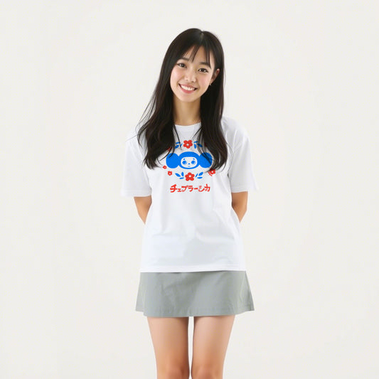 Cute japanese girl wearing white unisex T-shirt with vintage Soviet cartoon character Cheburashka with flowers and チェブラーシカ text in Japanese