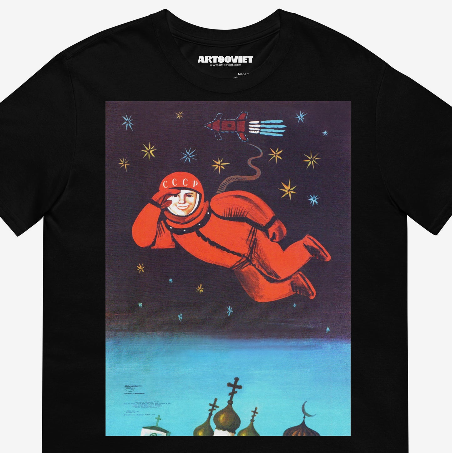 Black unisex tee with Yuri Gagarin flying above churches. Iconic Soviet propaganda art. Closeup details. www.artsoviet.com