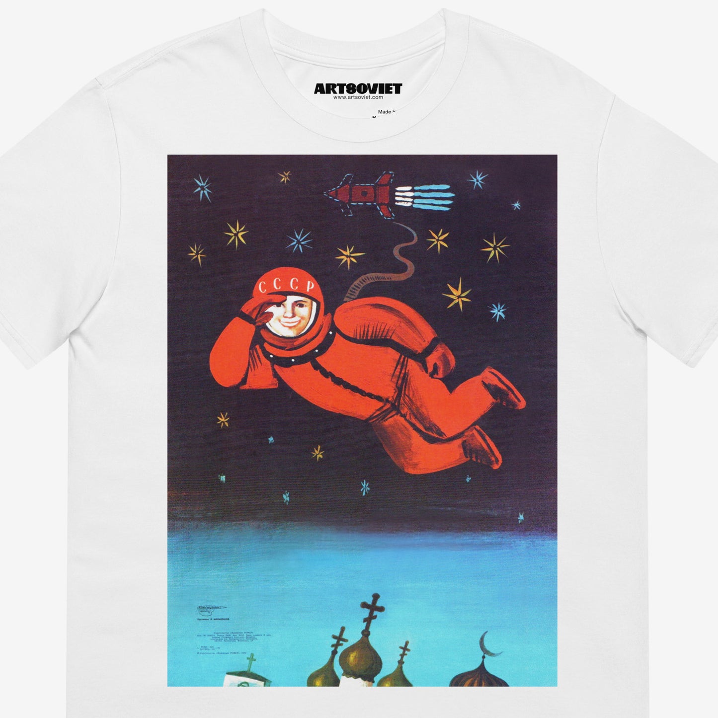 White unisex tee with Yuri Gagarin flying above churches. Iconic Soviet propaganda art. Closeup details. www.artsoviet.com