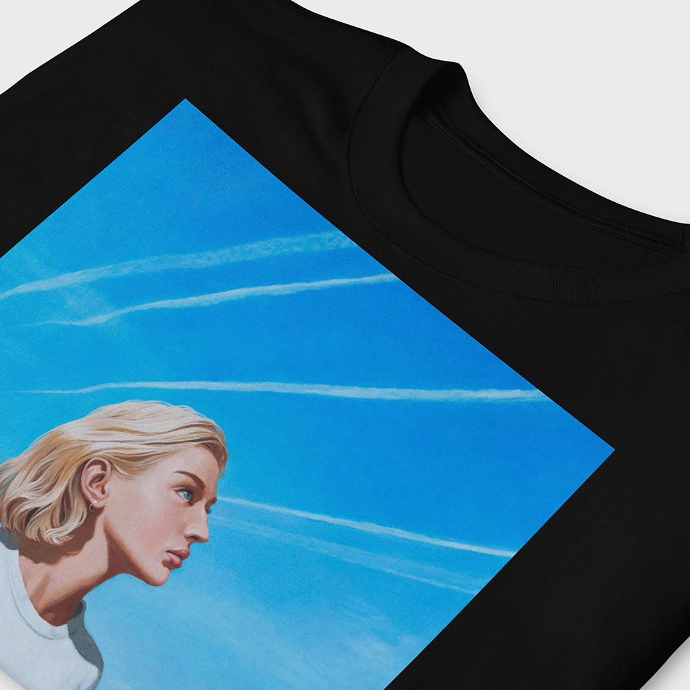 Unisex T-shirt with Soviet girl with letter to Leningrad, next to blue postbox, sky trails above, green village field – sensual and nostalgic artwork