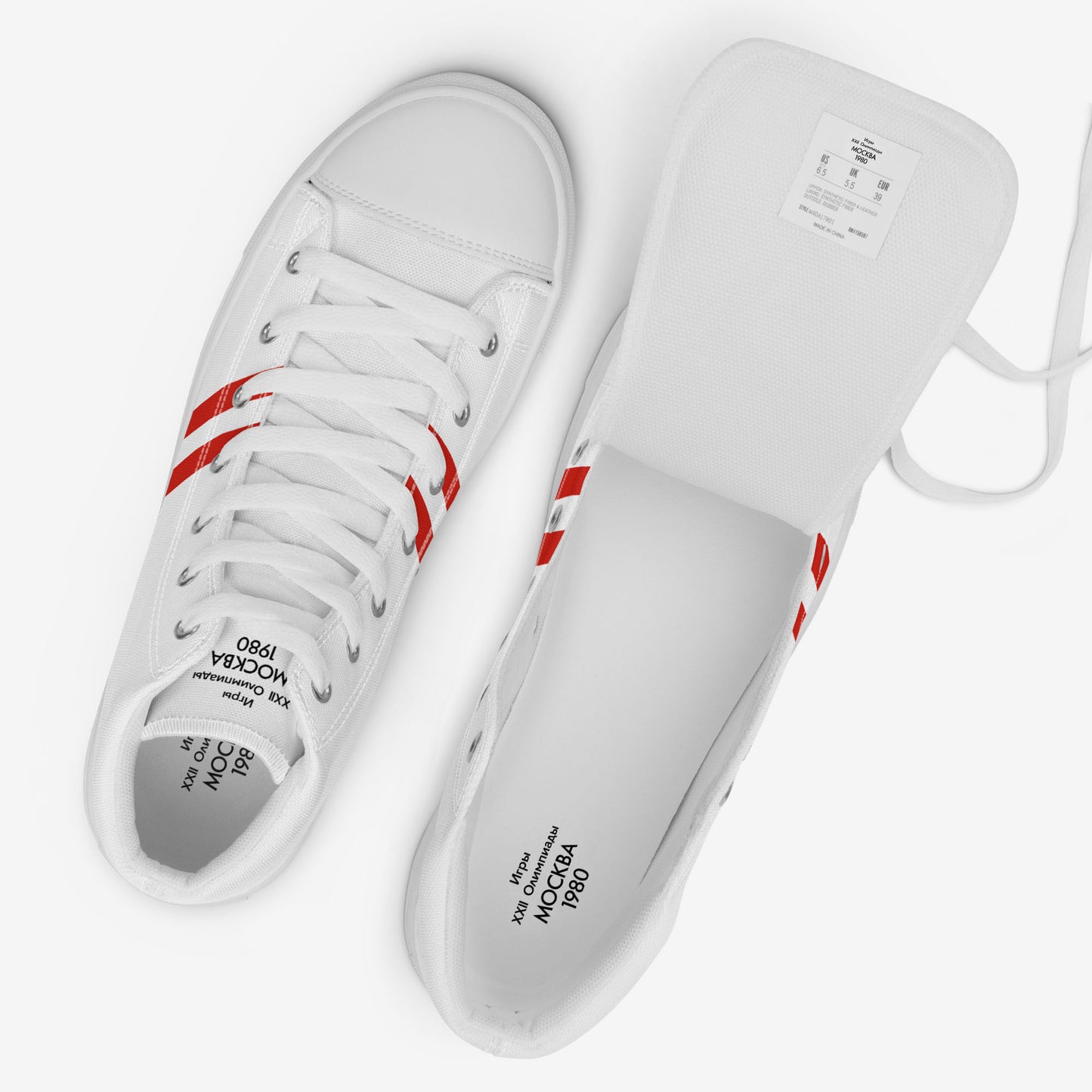 Moscow 1980 Olympic Games high-top shoes with vintage red graphics on white canvas, featuring the Olympic emblem and retro stripes. Unlaced with brabded insole seen. www.artsoviet.com