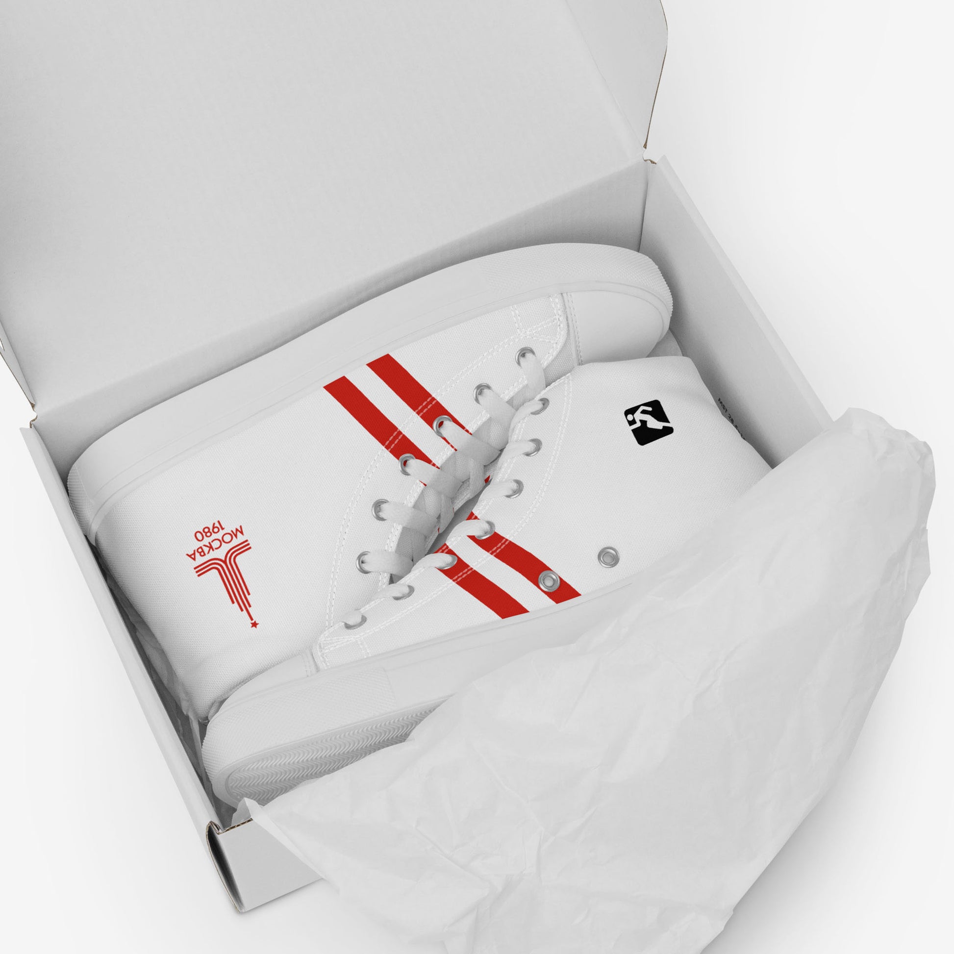 Moscow 1980 Olympic Games high-top shoes with vintage red graphics on white canvas, featuring the Olympic emblem and retro stripes. In opened shoebox. www.artsoviet.com