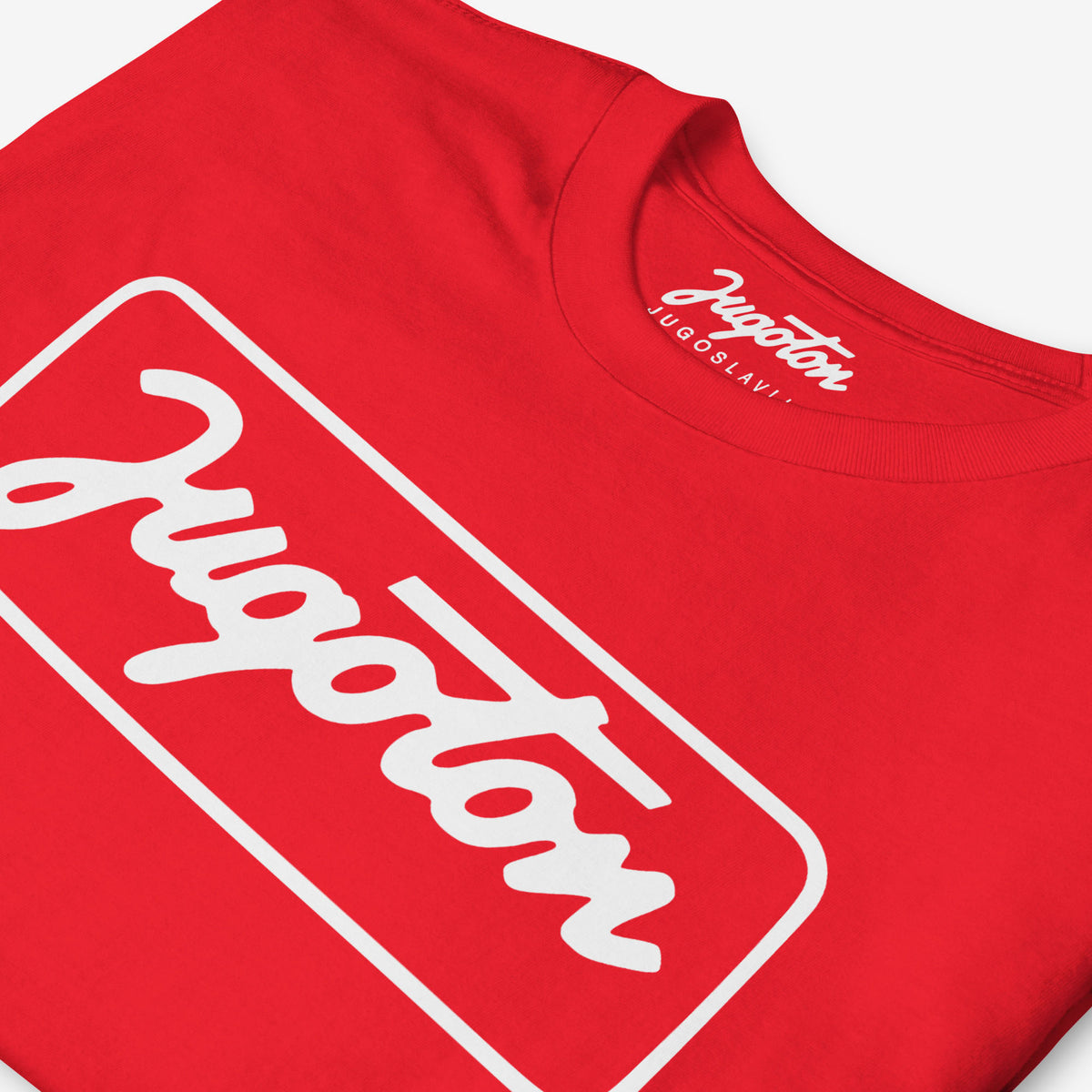 Vintage red unisex graphic Tee featuring the iconic framed white cursive Jugoton record label logo from Yugoslavia. Closeup