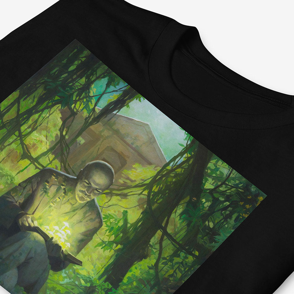 T-shirt with surreal image of Lenin statue in forest reading a book with glowing green mushrooms growing from it and on him