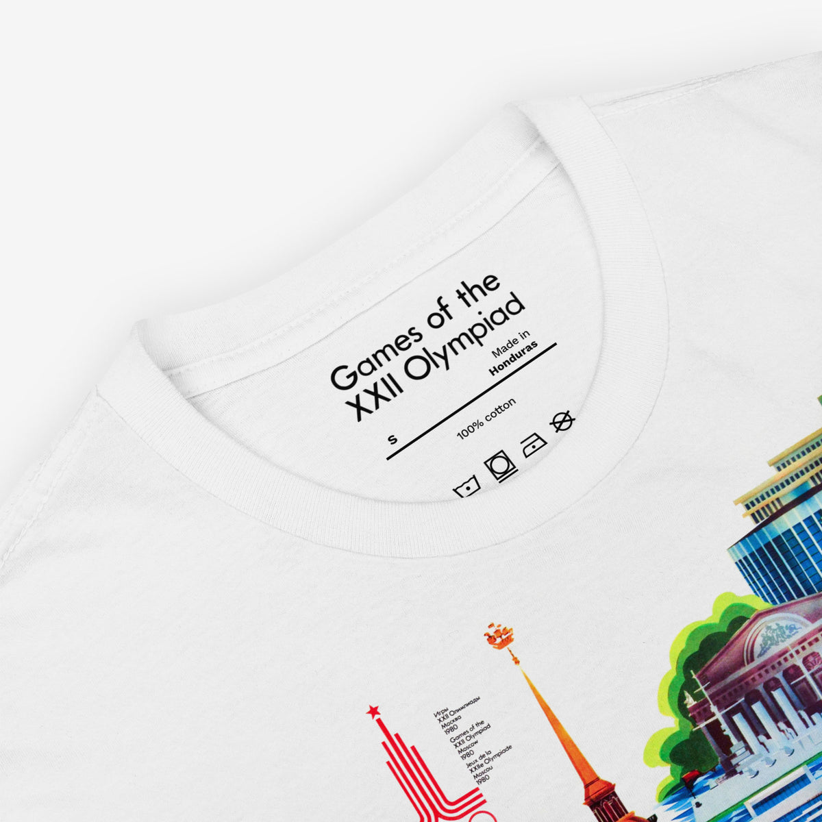 Official retro Soviet 1980 Olympic Games in Leningrad unisex white T-shirt. Closeup photo showing custom necktag design with text "Games of the XXII Olympiad"