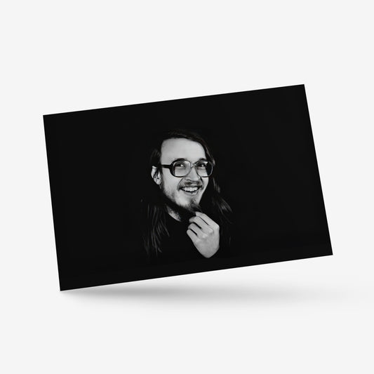 Postcard featuring a rare smiling photo of Egor Letov, frontman of Grazhdanskaya Oborona.