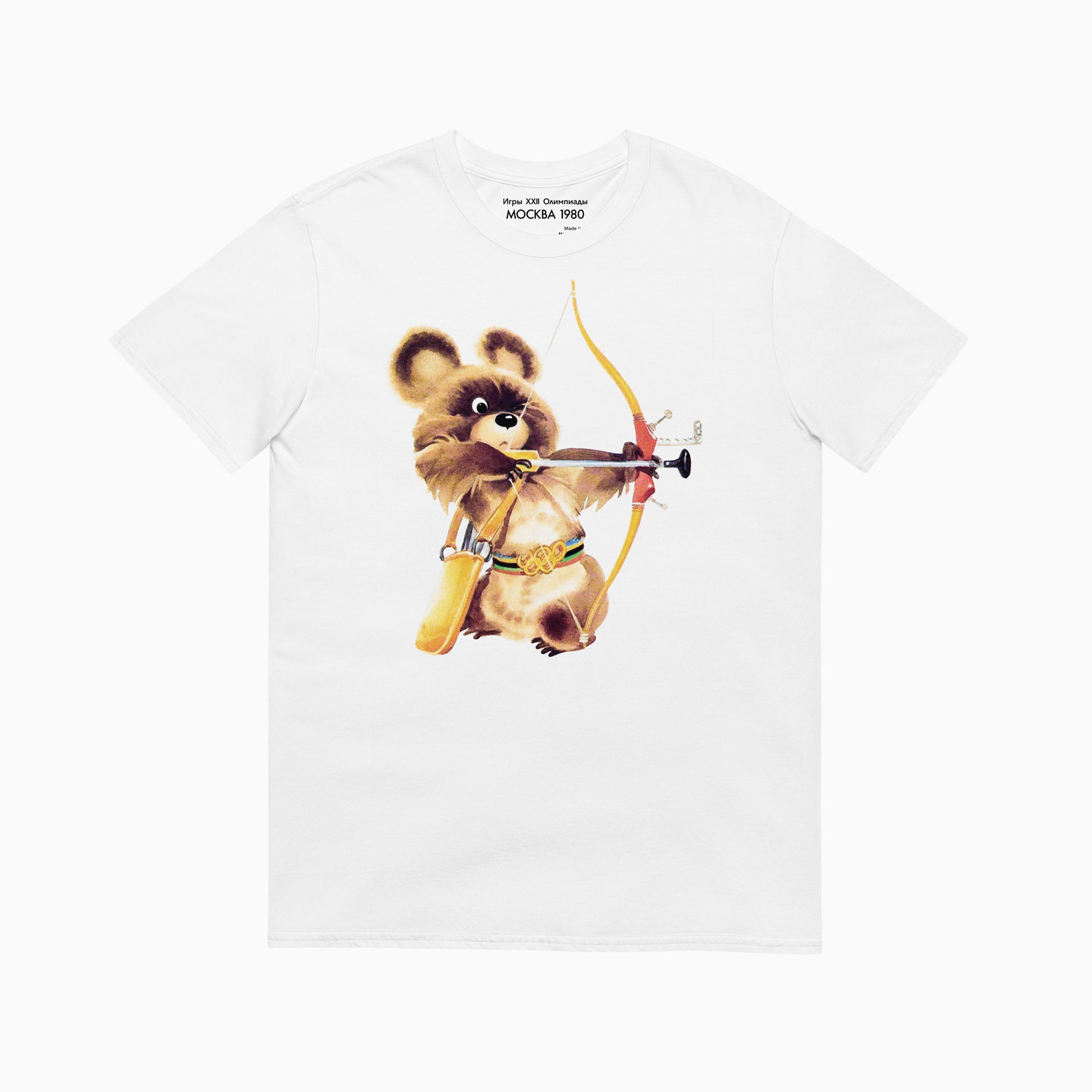 White unisex tee with large official USSR Moscow 1980 Olympics Bear Misha mascot as an archer. МОСКВА 1980 logo on the necktag. Original design sourced from private archives. Exclusive Soviet Olympic Games collectible. Ships worldwide. www.artsoviet.com