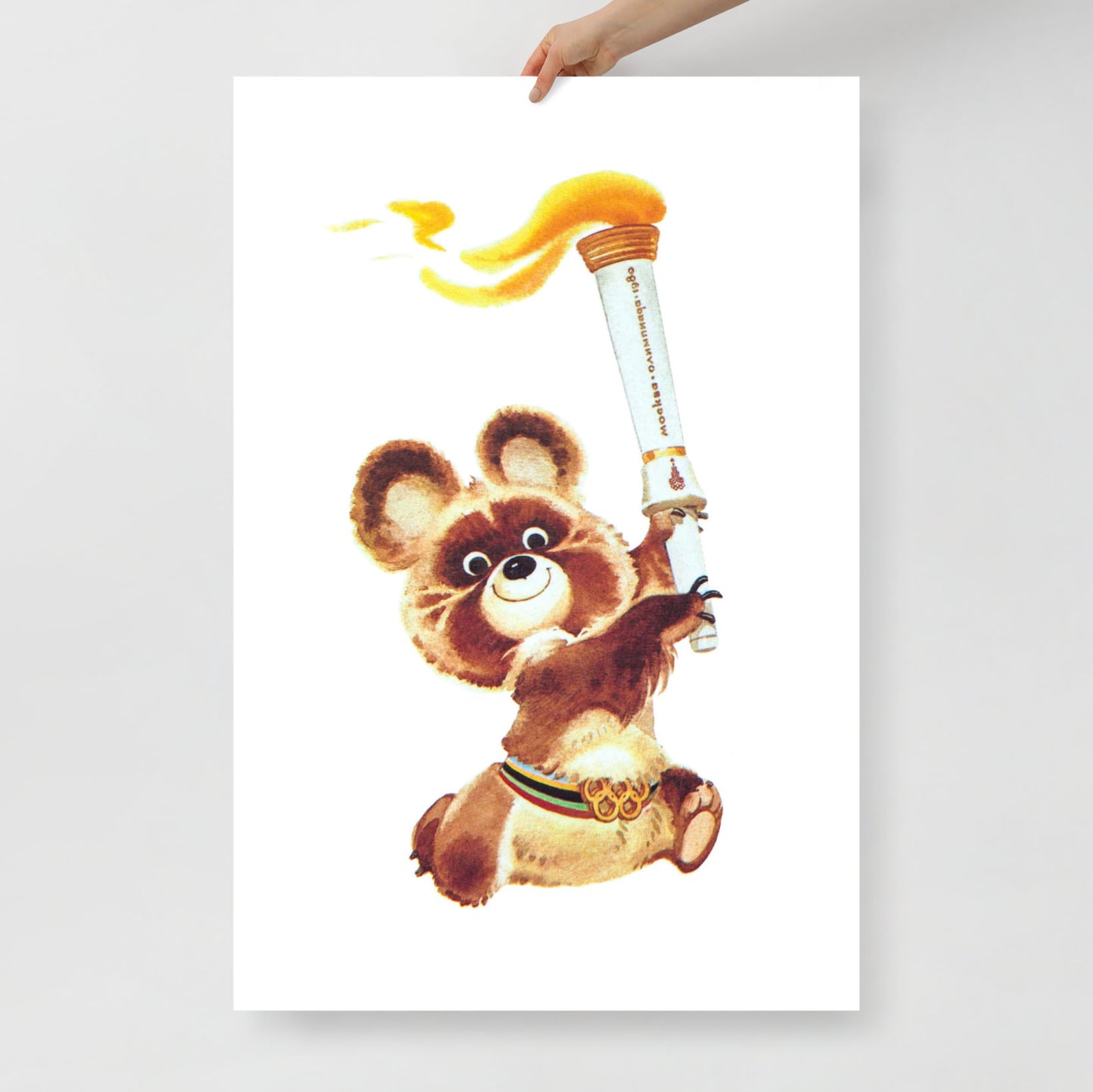 Rare 1980 Moscow Olympics poster featuring Misha the Olympic Bear holding the Olympic torch, symbolizing Soviet sportsmanship and Olympic history.