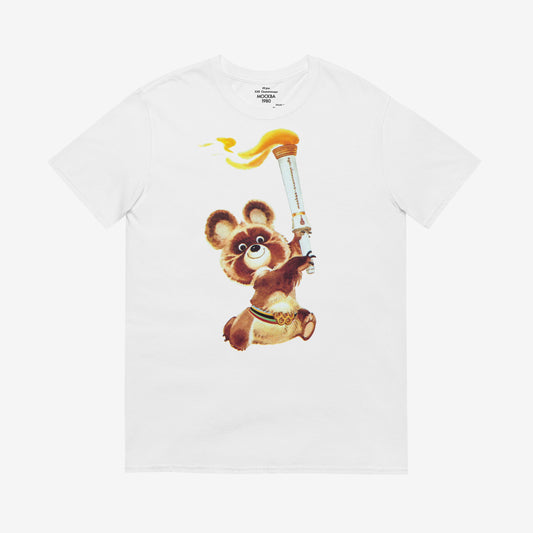 Misha the Olympic Bear white unisex T-shirt featuring the iconic 1980 Moscow Olympics design with the Olympic torch, celebrating Soviet sports history. www.artsoviet.com