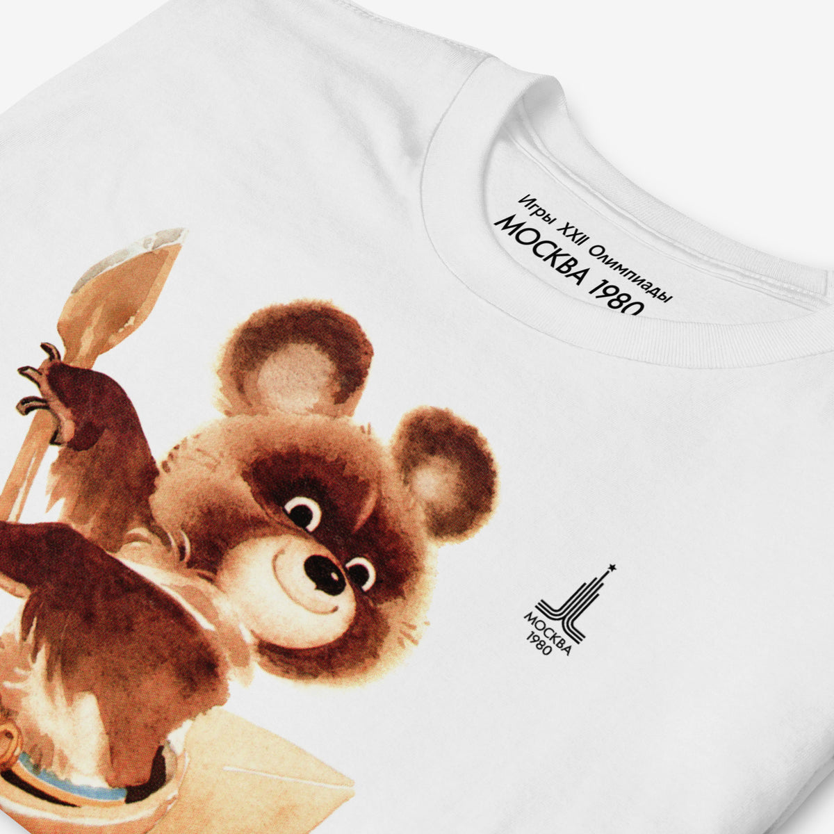 Original Soviet Moscow 1980 bear mascot Misha canoeing white unisex T-Shirt. Closeup