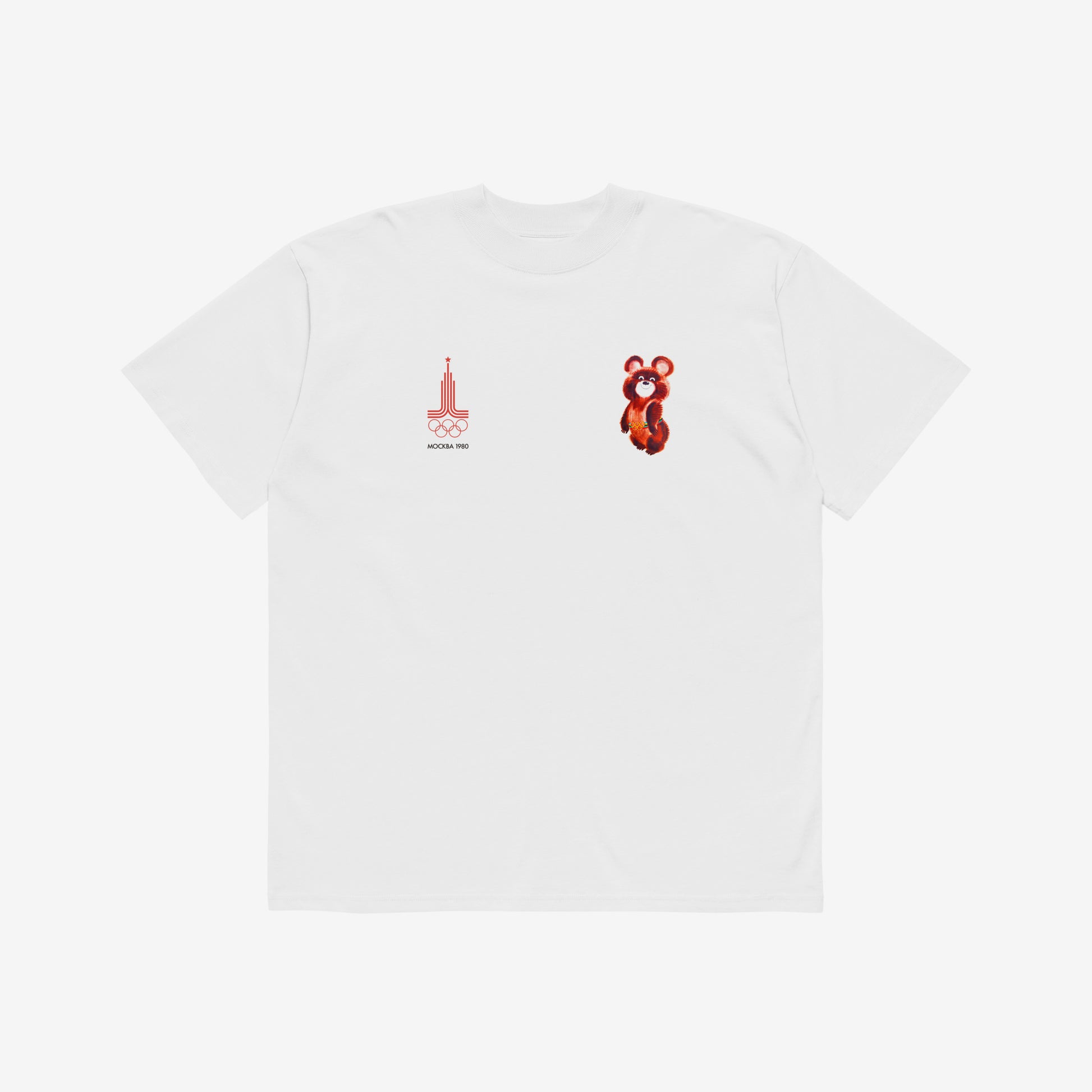 A white unisex premium quality Tee featuring an original red MOSCOW 1980 Olympics logo with 'МОСКВА 1980' wordmark on the left chest and official USSR Olympic Games bear mascot Misha on the right chest. www.artsoviet.com