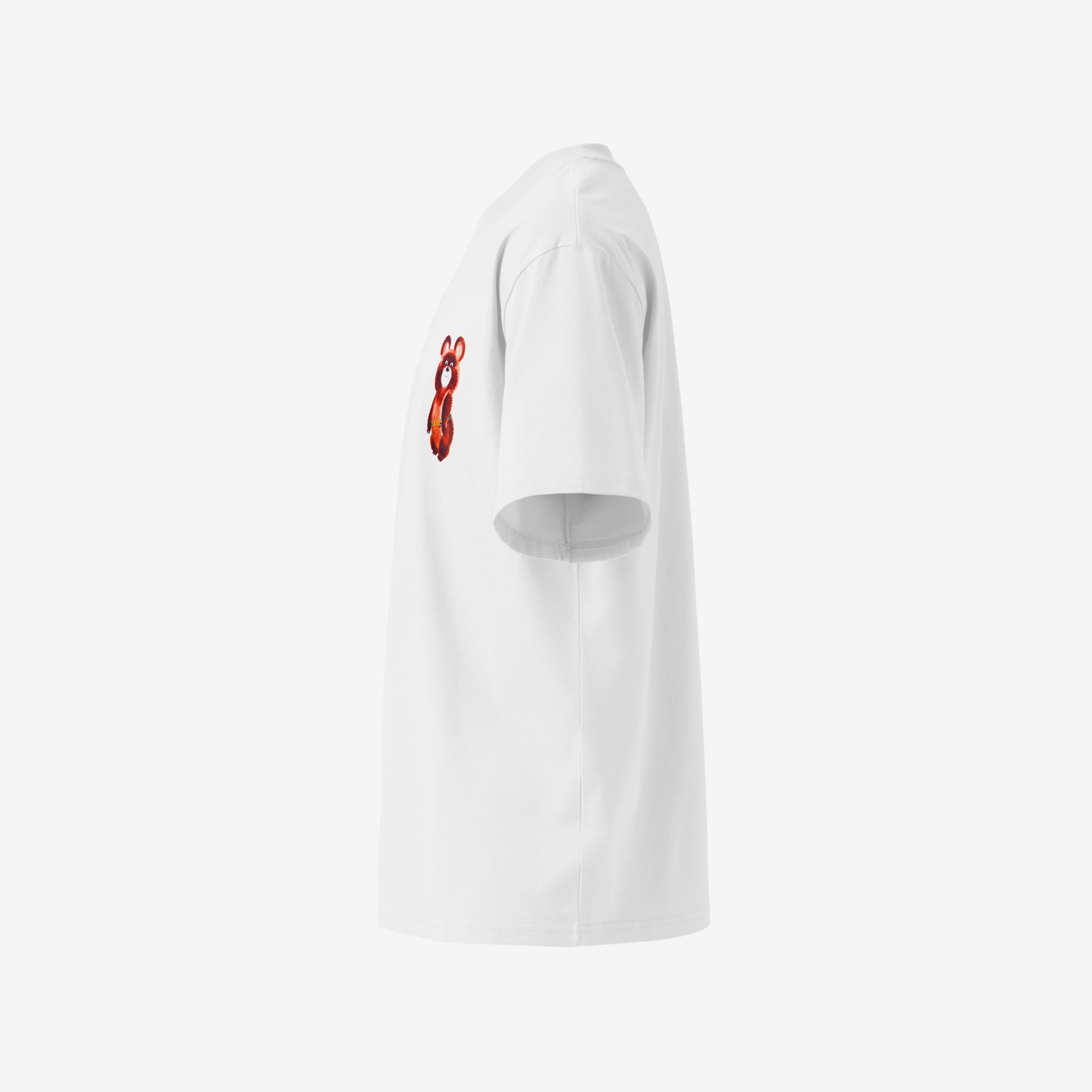 A white unisex premium quality Tee featuring an original red MOSCOW 1980 Olympics logo with 'МОСКВА 1980' wordmark on the left chest and official USSR Olympic Games bear mascot Misha on the right chest. 3D shaped mockup. Left side. www.artsoviet.com