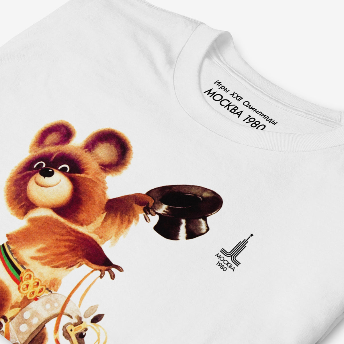 Original Soviet Moscow 1980 bear mascot Misha Equestrian white unisex T-Shirt. Necktag and print closeup