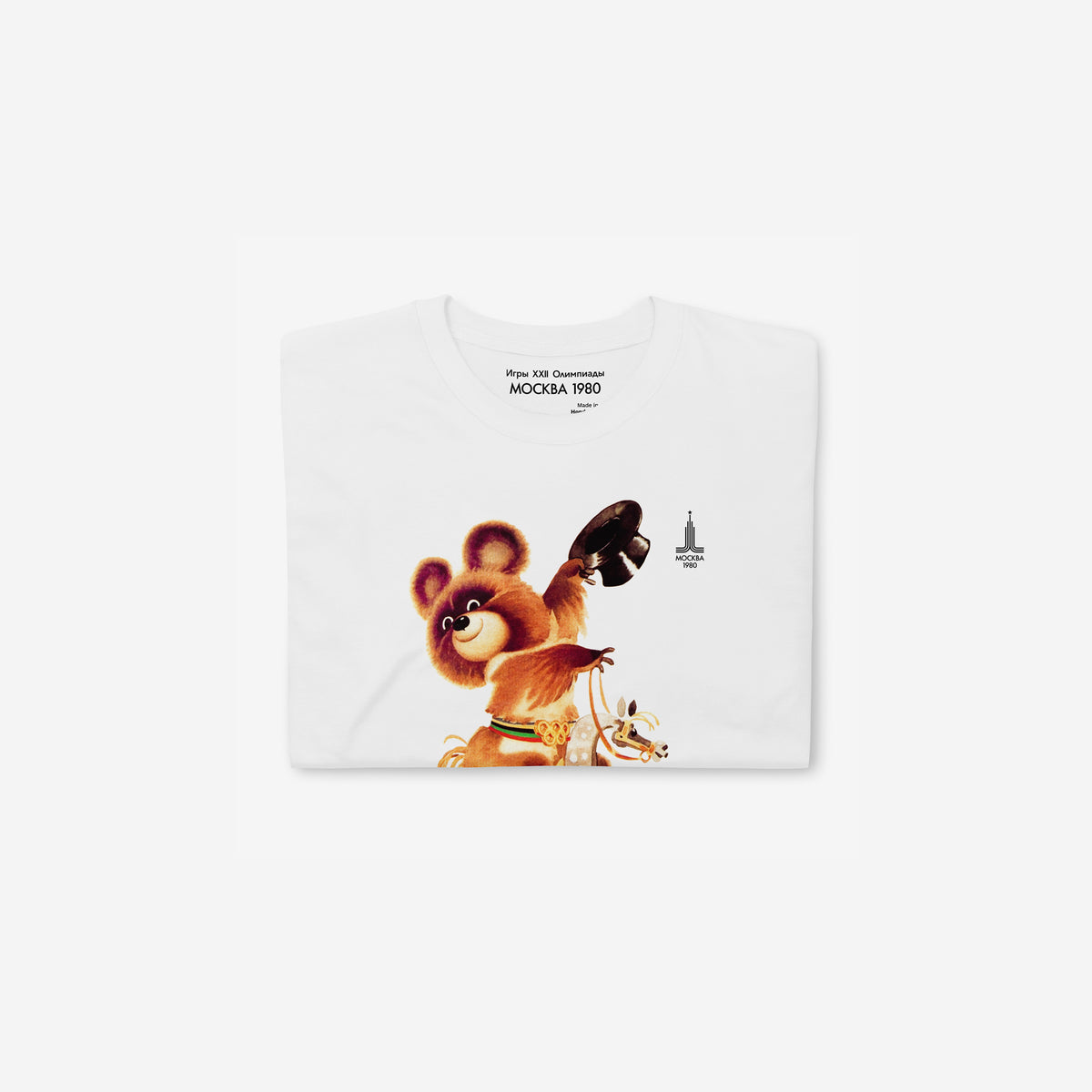 Original Soviet Moscow 1980 bear mascot Misha Equestrian white unisex T-Shirt. Folded