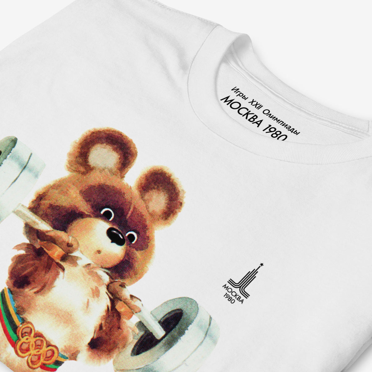 Original Moscow 1980 bear mascot Misha weightlifting white unisex T-Shirt. Closeup