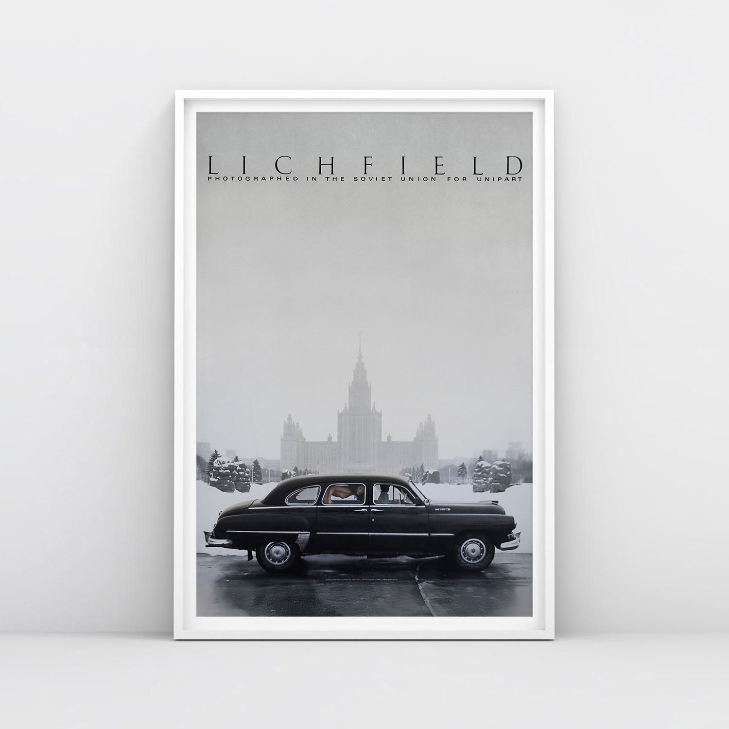 Late Soviet Moscow photo poster with Chaika car, nude woman inside, and Stalinist skyscraper in background – with cinematic tone.