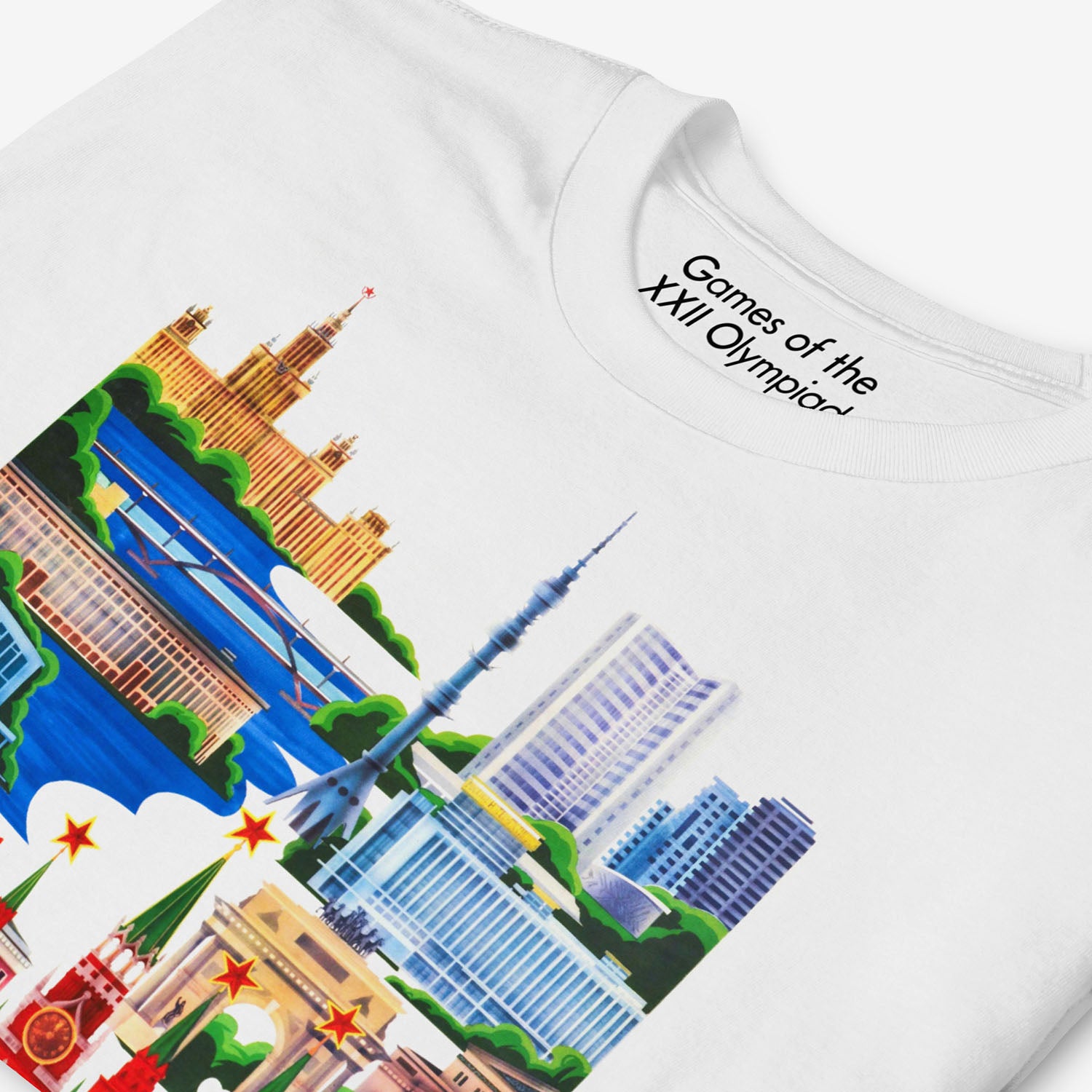 Unisex white T-shirt with Moscow 1980 Olympic Games art featuring Kremlin, Ostankino Tower, and Moscow landmarks. Closeup photo. www.sovisual.art
