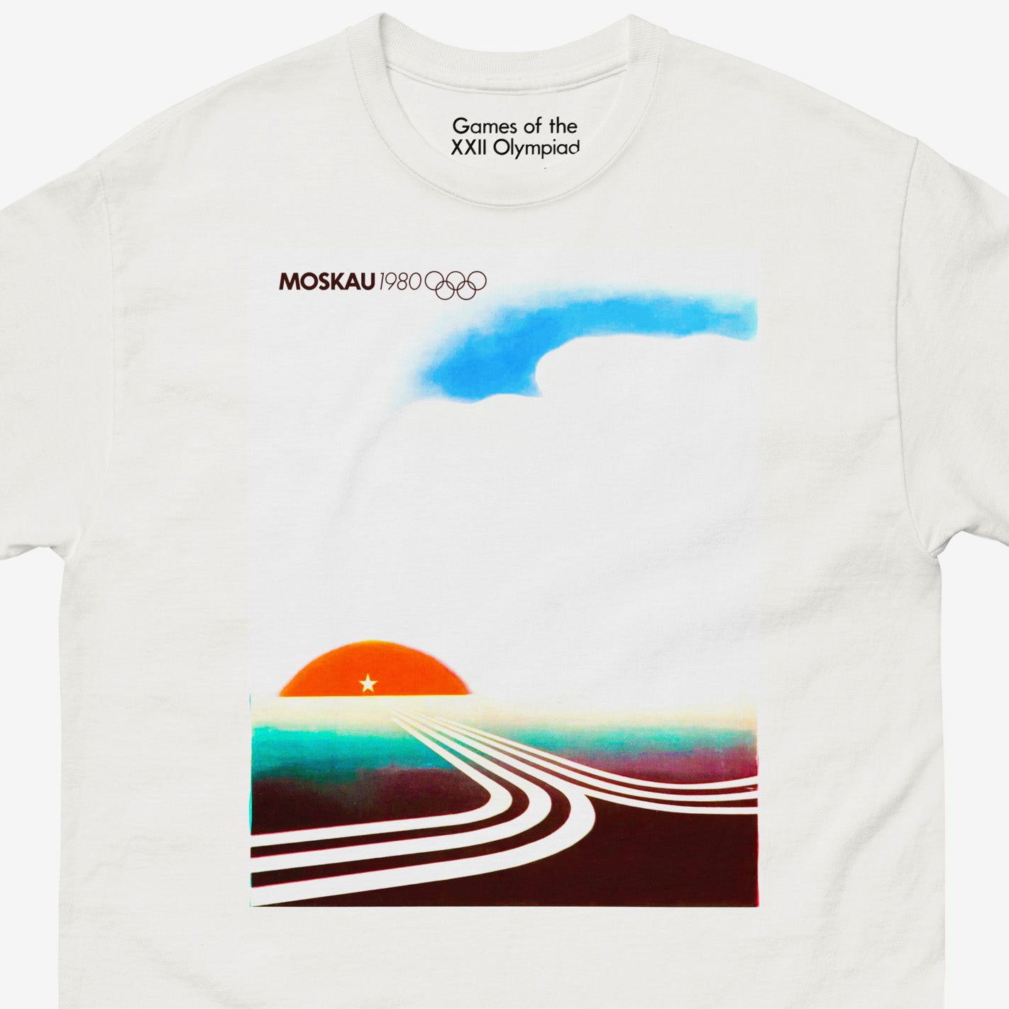 Unisex white Moscow 1980 Olympic Games T-shirt with text MOSCAU, Olympic logo and minimalist composition with rising sun and roads made of Moscow Olympics logo going towards it. Closeup photo. From artsoviet.com