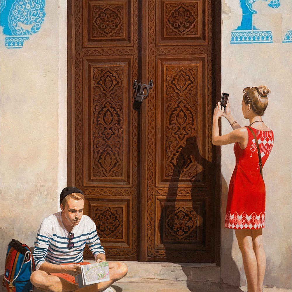 Large poster of post-Soviet youth in Bukhara with girl taking photo and boy reading map by historic blue-tiled Uzbek door