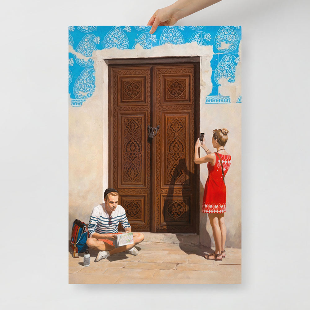 Large poster of post-Soviet youth in Bukhara with girl taking photo and boy reading map by historic blue-tiled Uzbek door