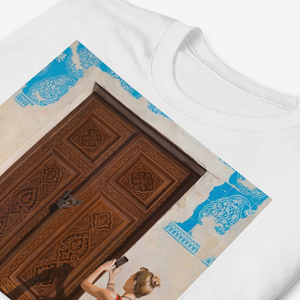 Unisex T-shirt with Russian girl photographing Uzbek door and boy reading map beside historic blue-tiled building in Bukhara