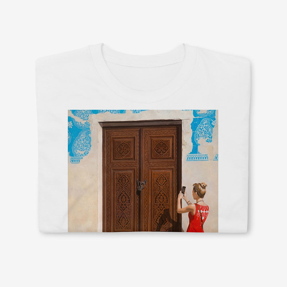 Unisex T-shirt with Russian girl photographing Uzbek door and boy reading map beside historic blue-tiled building in Bukhara