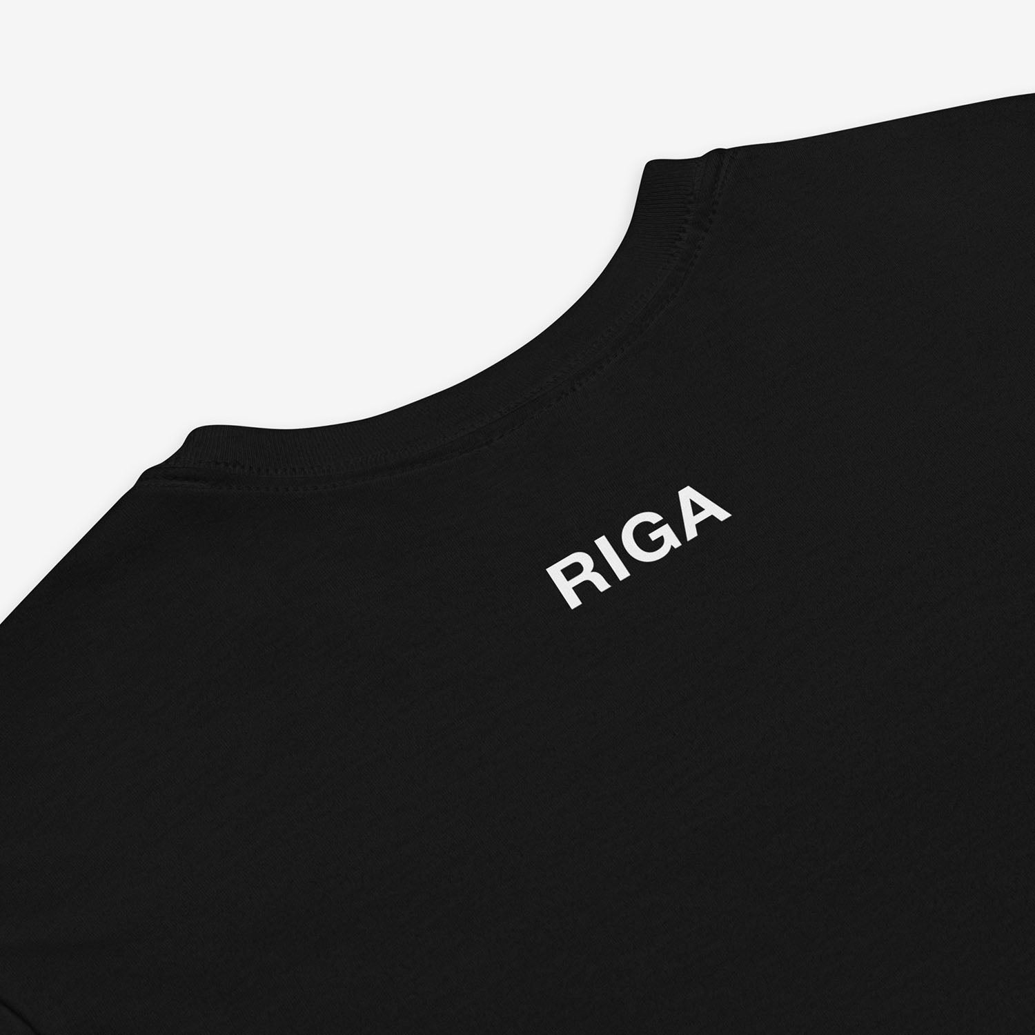 Minimalist Cyrillic Рига (Riga) T-shirt in Soviet-style typography, inspired by Latvian culture