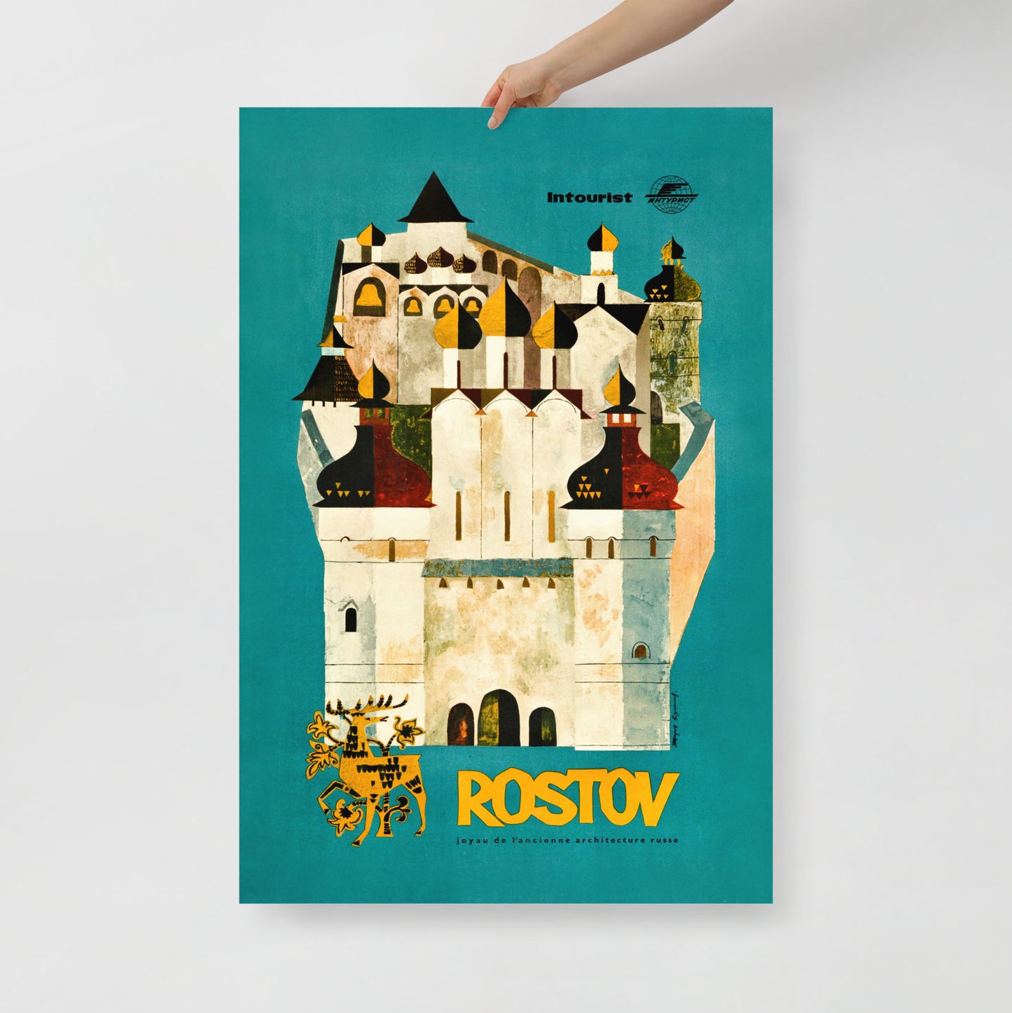 Hand holding the large-format Archival Print of the Intourist Rostov poster, showing the print's 62x91cm collectible size. www.arthodox.com