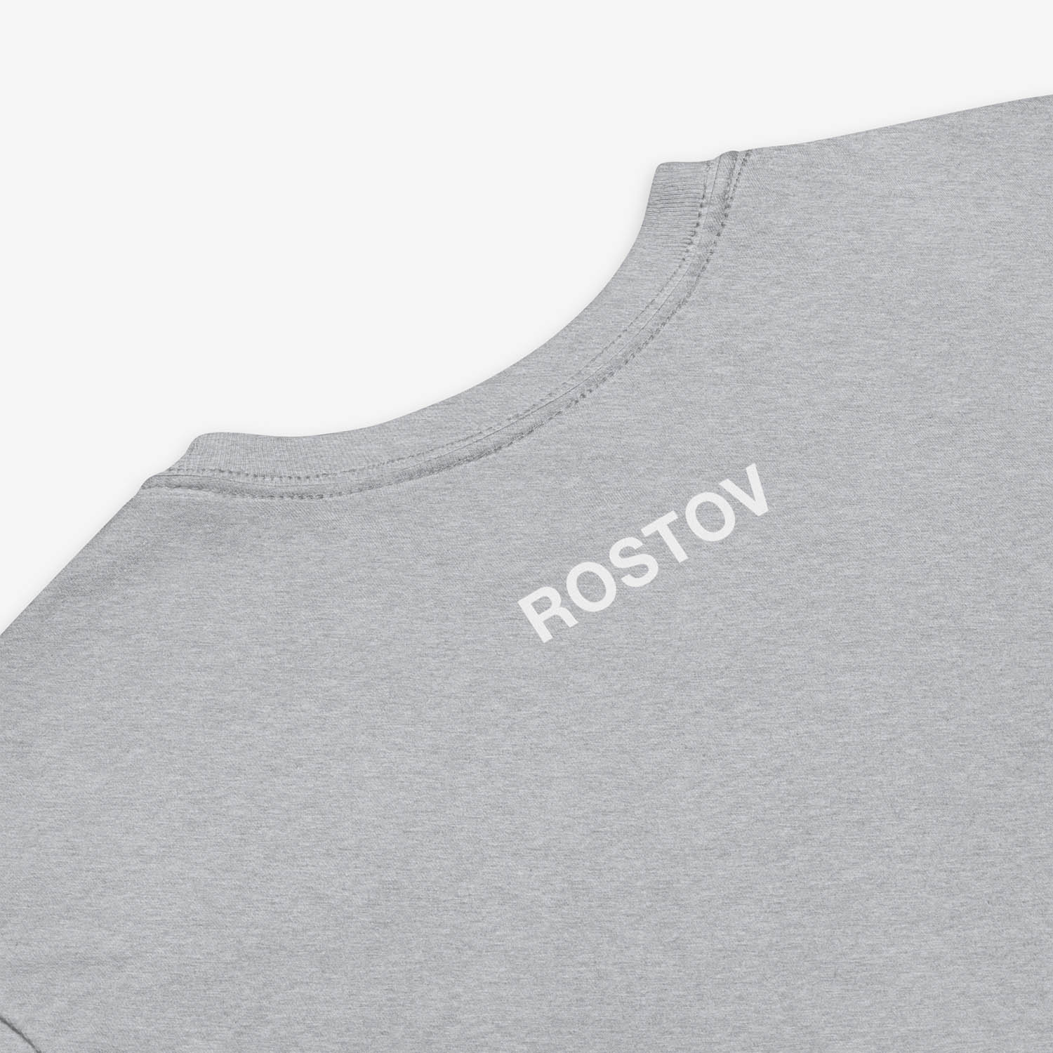 Minimalist Cyrillic РОСТОВ T-shirt design with small ROSTOV label outside back neck, tribute to Russian city