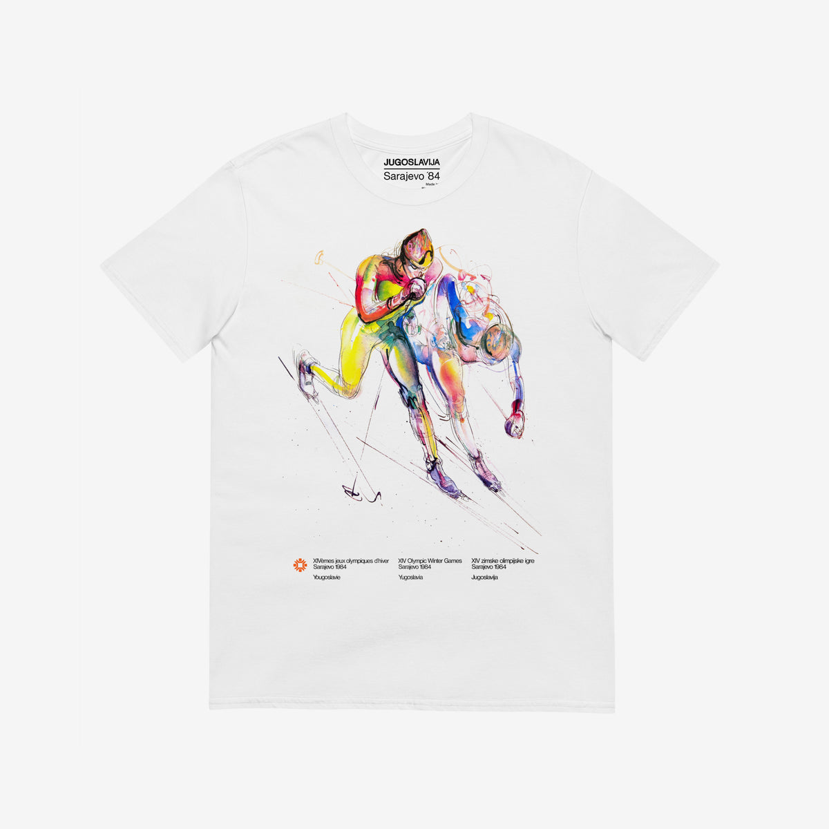 White unisex T-shirt featuring large artwork of Sarajevo 1984 Yugoslavian Winter Olympics Skiing artwork by Ismar Mujezinović
