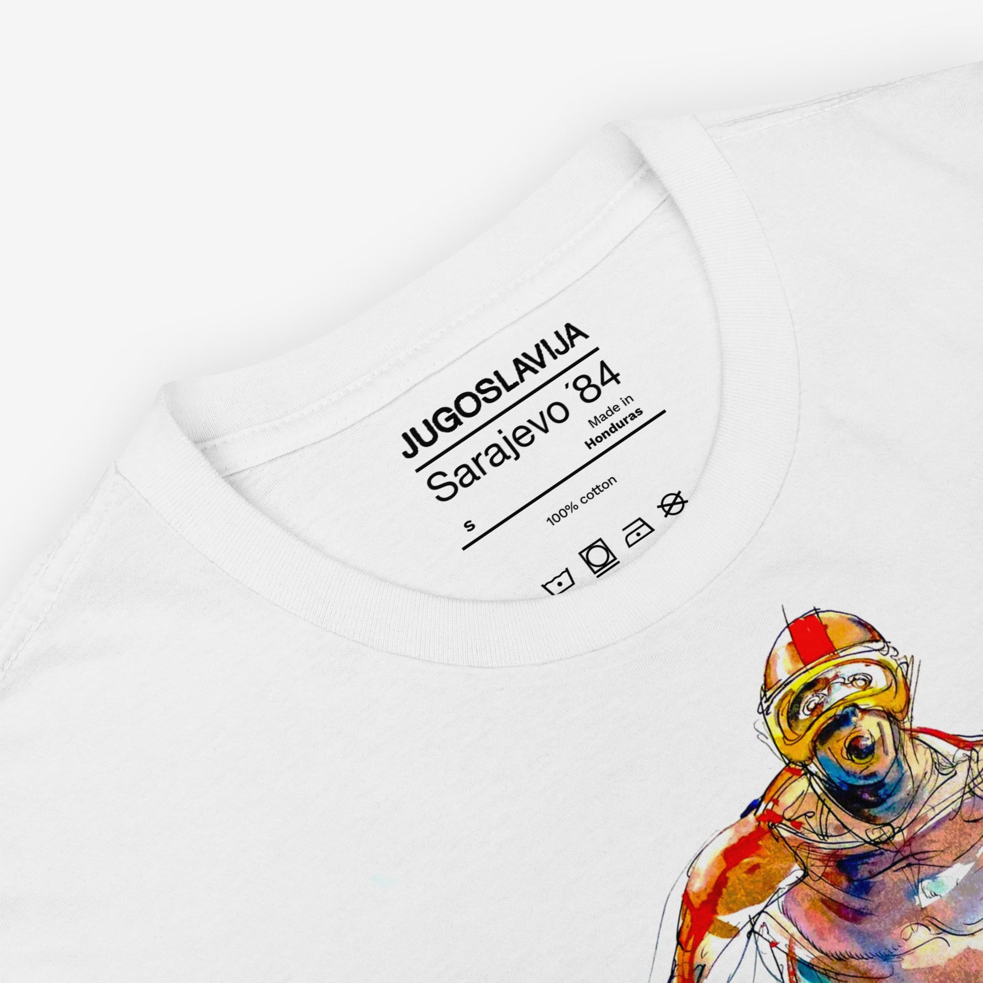 Unisex white T-shirt with Sarajevo 1984 Olympic ski jumping artwork by Ismar Mujezinovic. Large print. Closeup necktag with Jugoslavija Sarajevo 84 logo. www.artsoviet.com