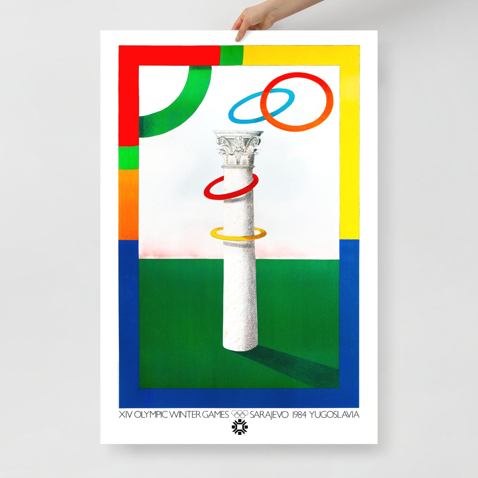 Large poster of Milton Glaser’s Sarajevo 1984 Olympic design with antique column and Olympic rings