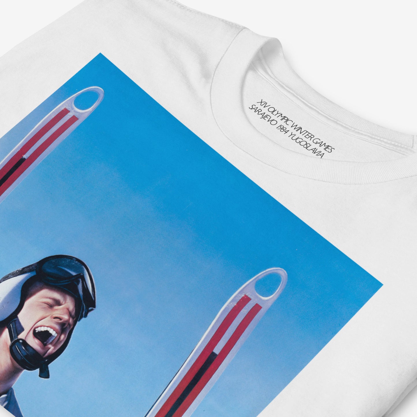 Yugoslavia Olympic Games white unisex T-shirt featuring large print of Sarajevo 1984 Winter Olympics skier. Closeup print details. www.artsoviet.com