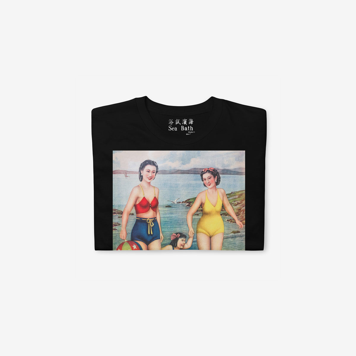 Vintage Soviet Chinese 1940s Shanghai Sea Bath black unisex Tee featuring large print with two ladies in swim suits swimming with a girl child. Folded