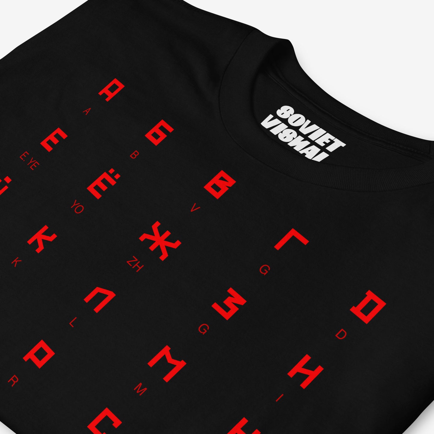 Close-up of the Russian alphabet design in authentic Soviet font on a black T-shirt