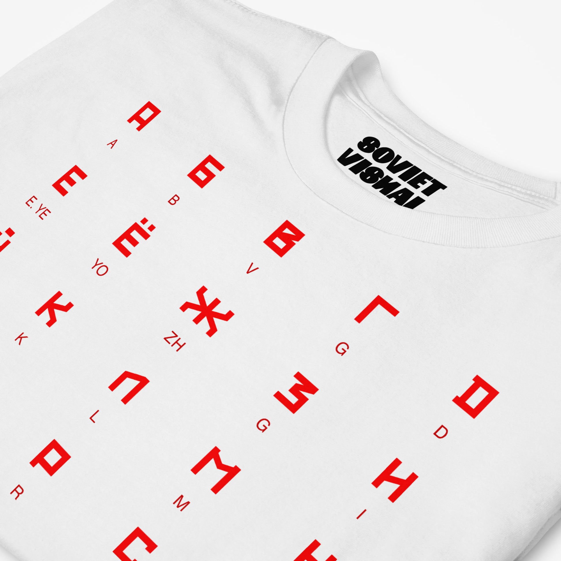 Close-up of the Russian alphabet design in authentic Soviet font on a white T-shirt