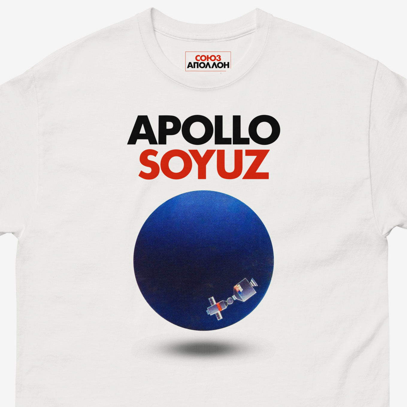 Premium T-shirt with Soyuz Apollo Space Mission logo and planet earth with Space station. Closeup photo. From artsoviet.com