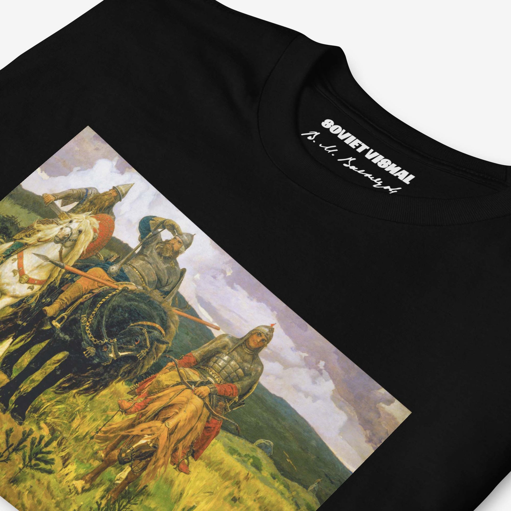 T-shirt featuring Viktor Vasnetsov's Three Bogatyrs painting, depicting three legendary Russian warriors in a high-quality print.
