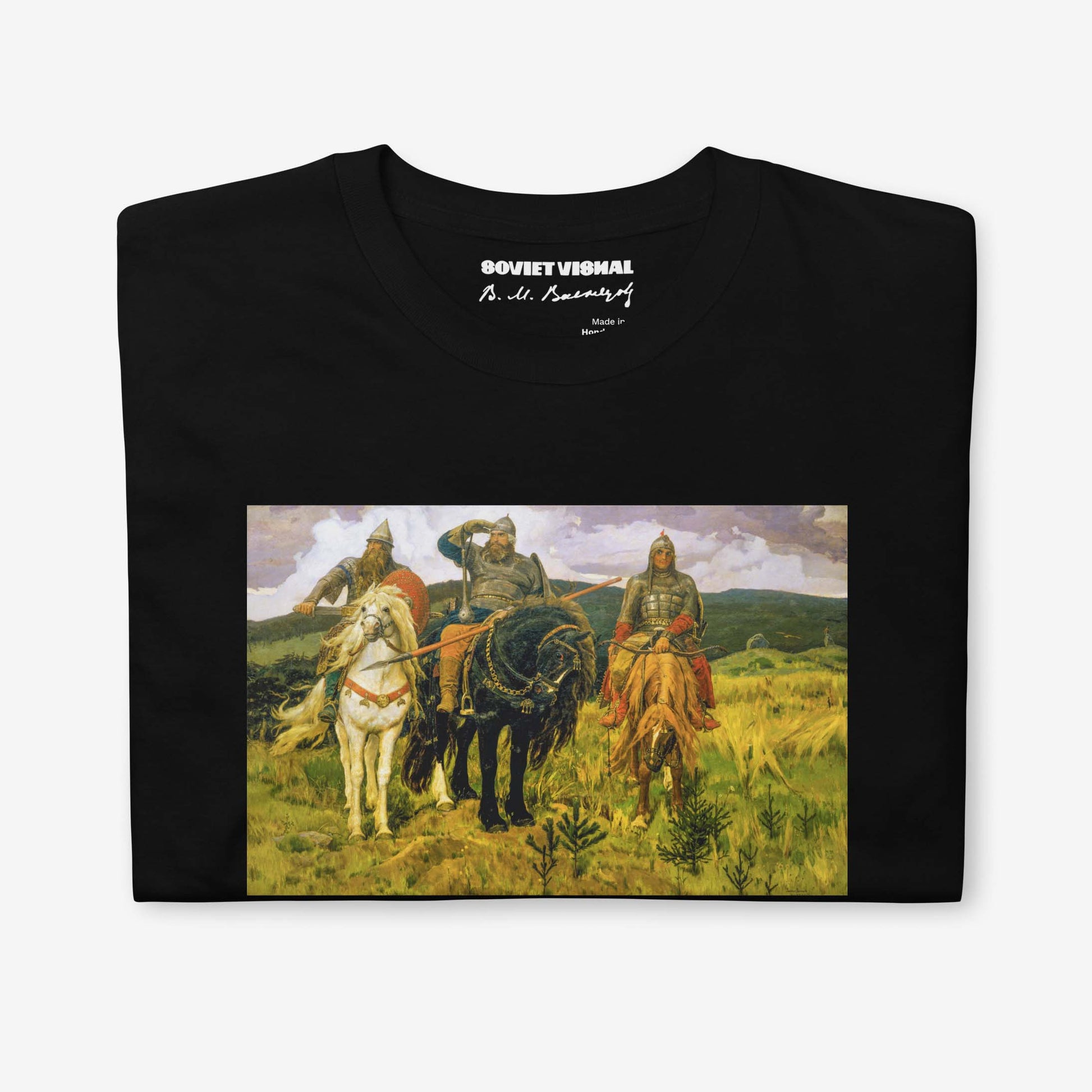 T-shirt featuring Viktor Vasnetsov's Three Bogatyrs painting, depicting three legendary Russian warriors in a high-quality print.