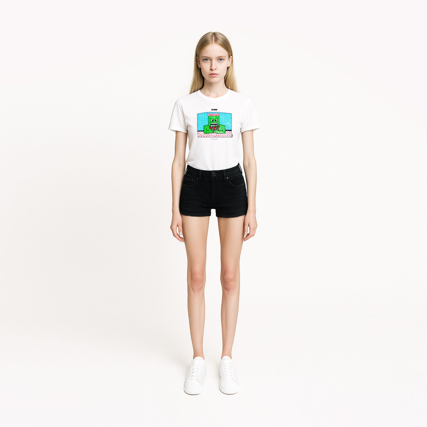 Model girl wearing rare 1980s Viktor Tsoi painting with a green man holding red human figures, printed on the front of a heavyweight unisex t-shirt with a KINO logo and original inside neck label design, from GruppaKino.com.