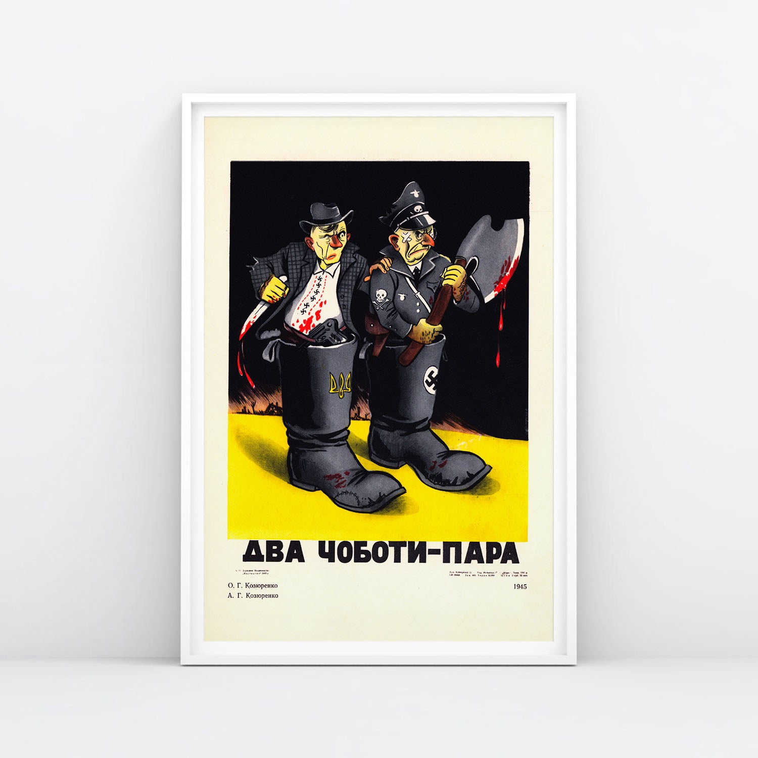 Large framed World War II Soviet propaganda poster showing Stepan Bandera with Ukrainian trident and Nazi militant with swastika in a boot, slogan “Two Boots — One Pair”. www.artsoviet.com