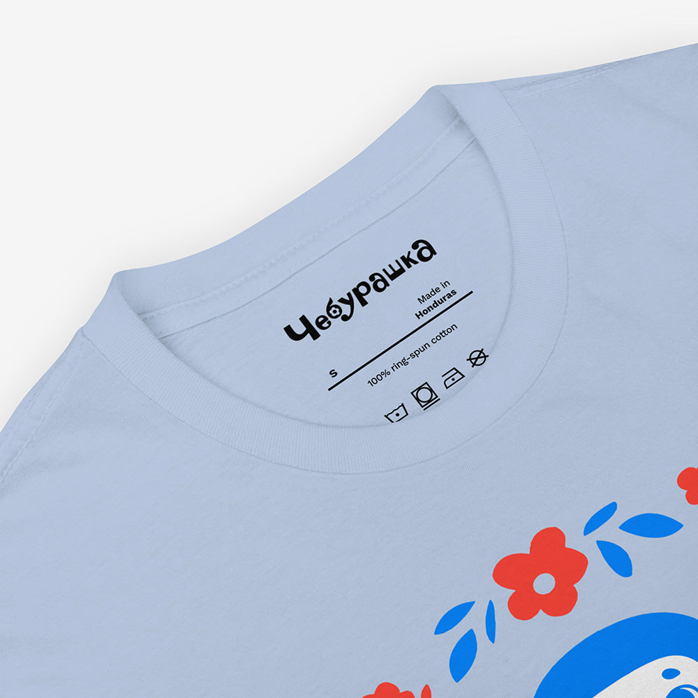 Unisex T-shirt with vintage Soviet cartoon character Cheburashka with flowers and チェブラーシカ text in Japanese