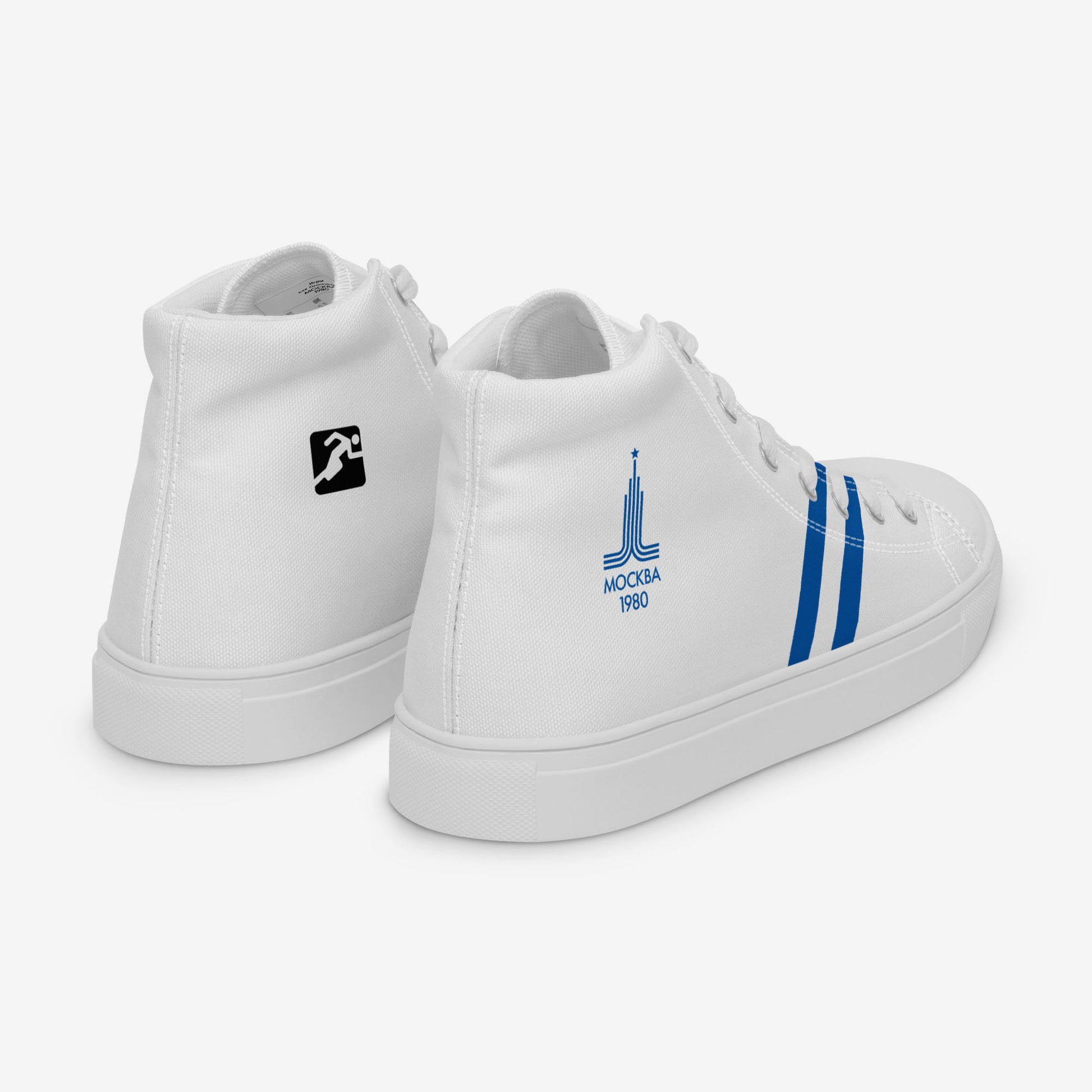 Womens Moscow 1980 Olympic Games high-top shoes with vintage navy graphics on white canvas, featuring the Olympic emblem and retro stripes.